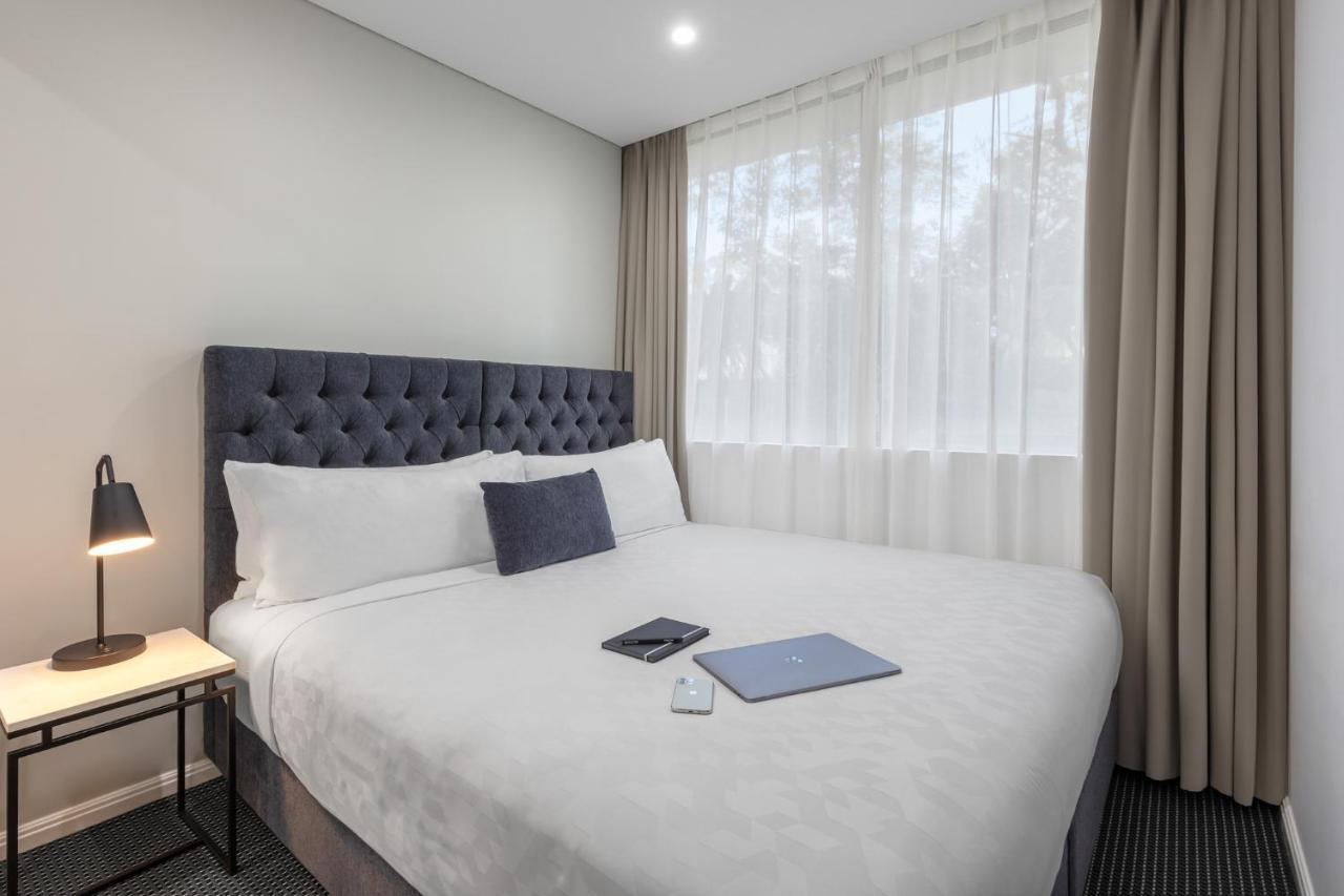 Meriton Suites North Ryde Sydney Zewnętrze zdjęcie A bedroom at the hotel