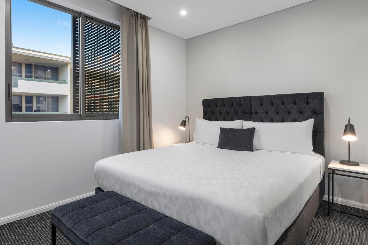 Meriton Suites North Ryde Sydney Zewnętrze zdjęcie A bedroom at the hotel